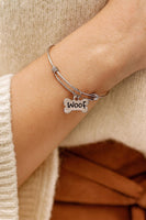 Woof Stainless Steel Adjustable Bangle Bracelet With Dog Bone Charm Pet Lover Jewelry Gift For Dog Owner Or Animal Rescue Support