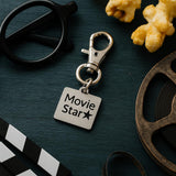 Stainless Steel Movie Star Clip On Charm Inspirational Gift For Actors Filmmakers Dreamers Keychain Bag Charm Motivational Accessory