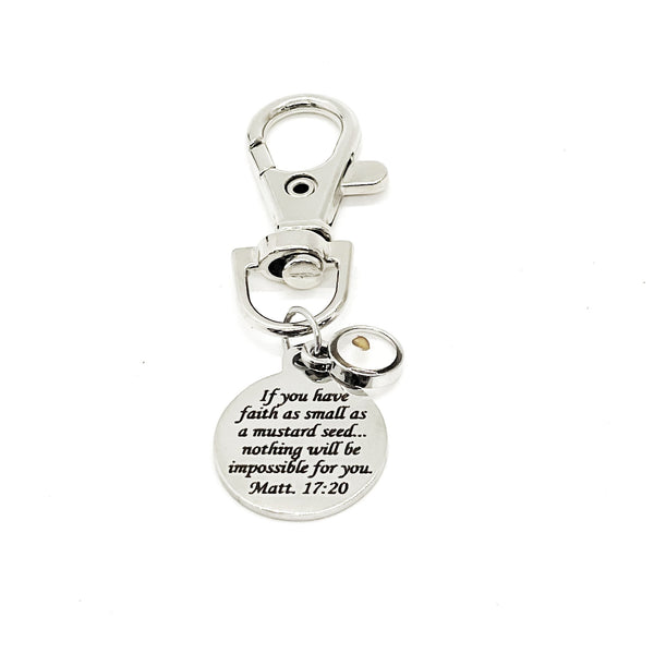 May include: A silver keychain with a round charm that reads &#39;If you have faith as small as a mustard seed... nothing will be impossible for you. Matt. 17:20&#39;.