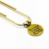 She Is Clothed Goldtone Bookmark Print Font