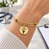 On GLP-1 Goldtone Notice Charm Bracelet